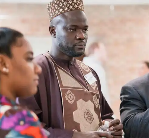 A Northwood University student in traditional African dress at an international cultural celebration, reflecting Northwood's value of embracing diverse, multicultural perspectives
